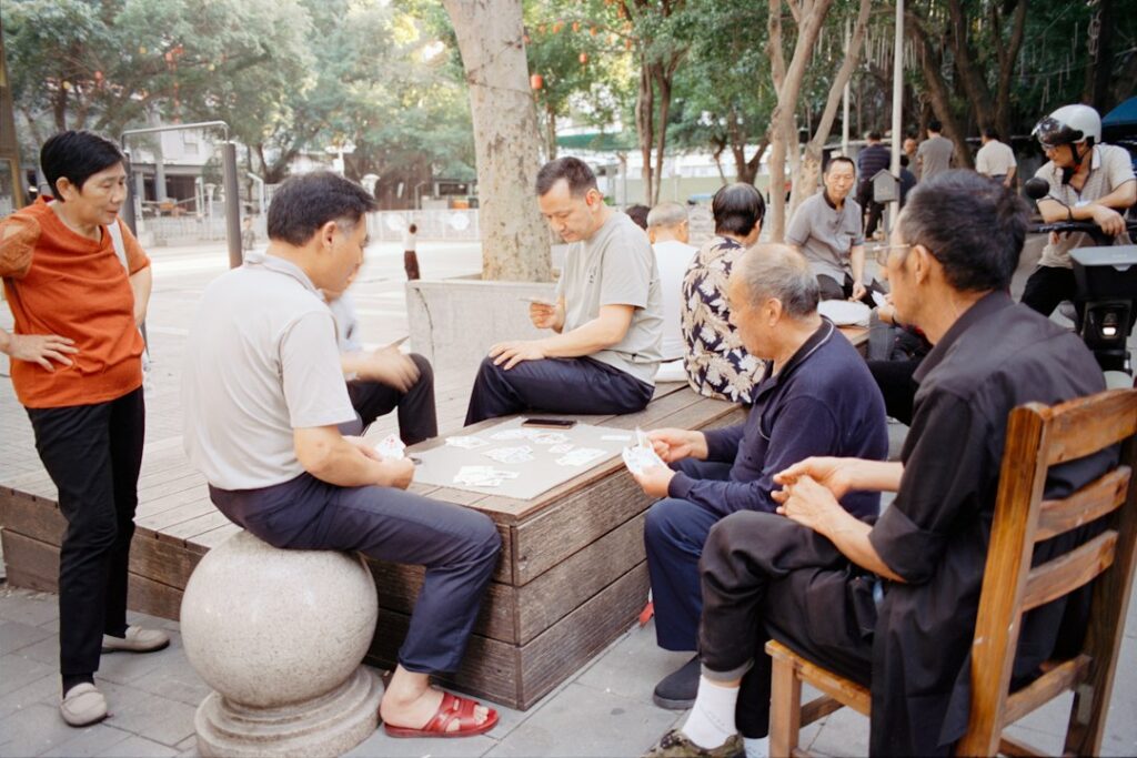 Person practicing calm breathing while waiting in a public indoor space